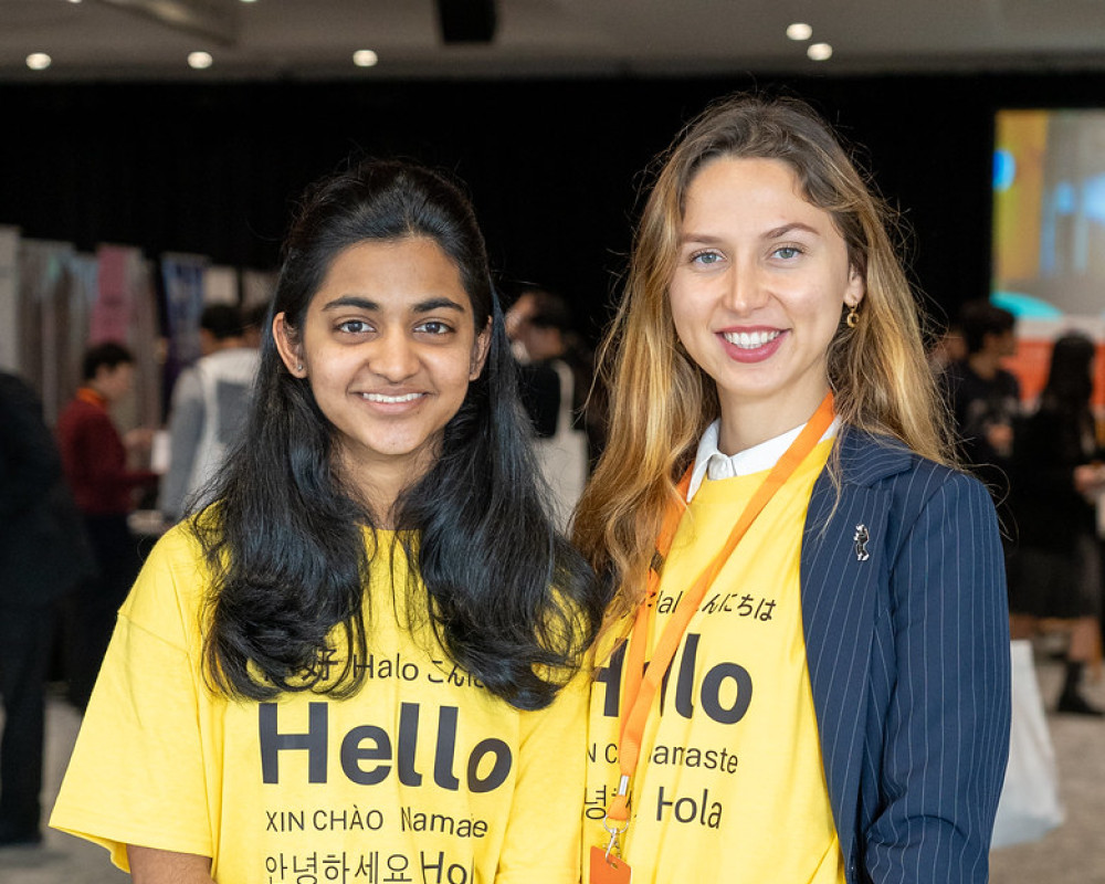 Volunteers and staff smiling at Study NSW Career Expo for International Students
